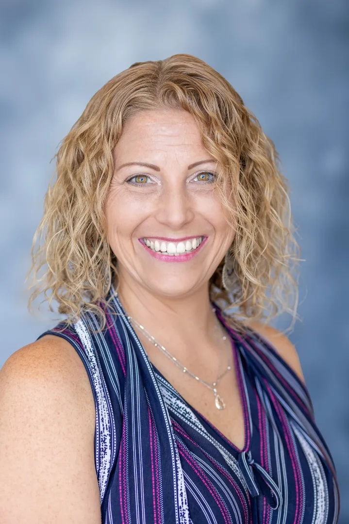 A portrait photograph of Jules Kovacs