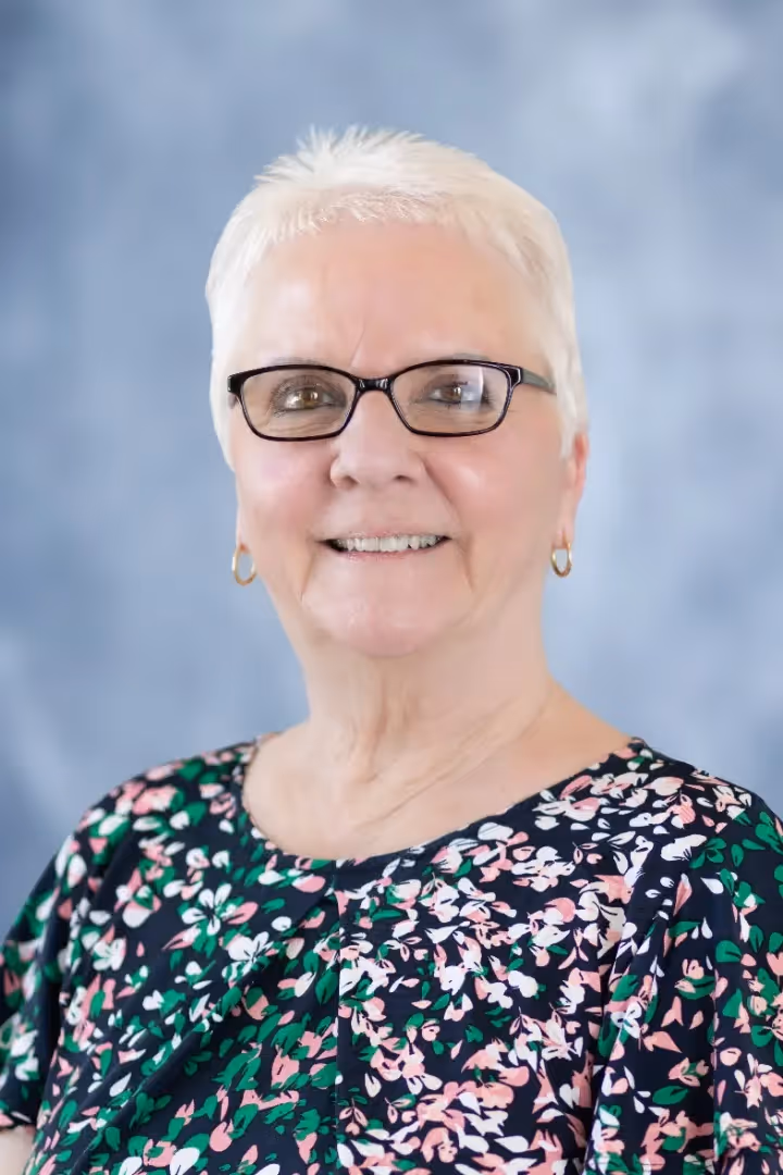 A portrait photograph of Judi Brown