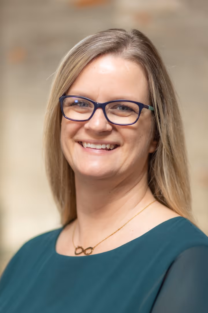 A portrait photograph of Jessica Parker