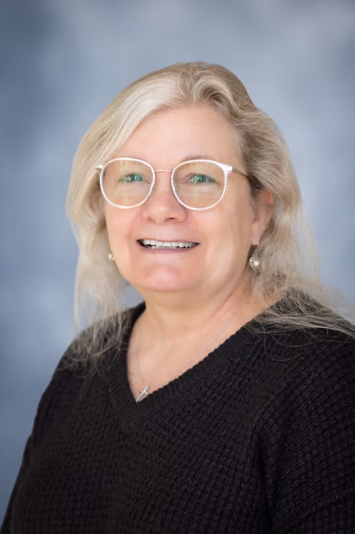 A portrait photograph of Jenny Schoo