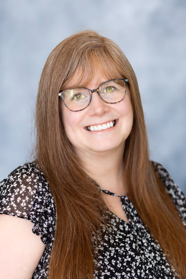 A portrait photograph of Jennifer Maynard