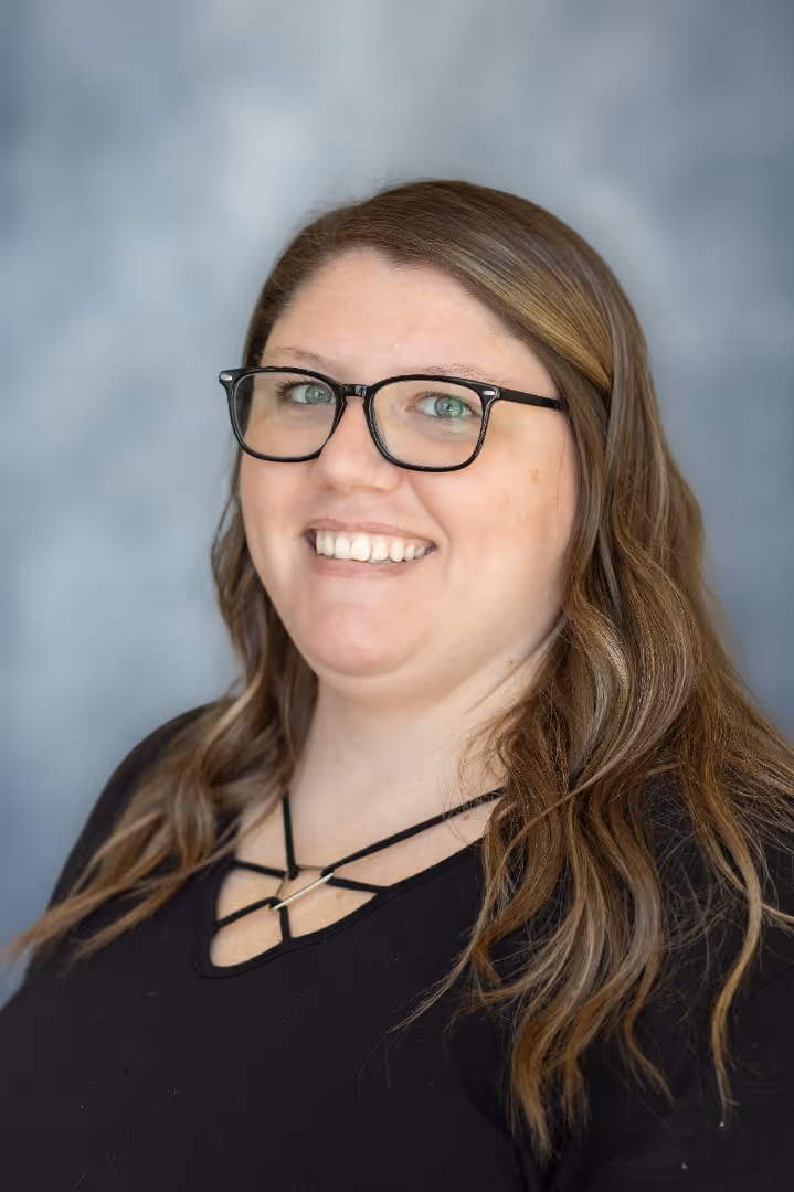 A portrait photograph of Emily Hankinson