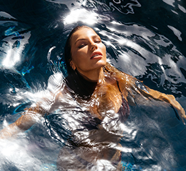 Editorial photoshoot of Nora at in a pool by The Latest