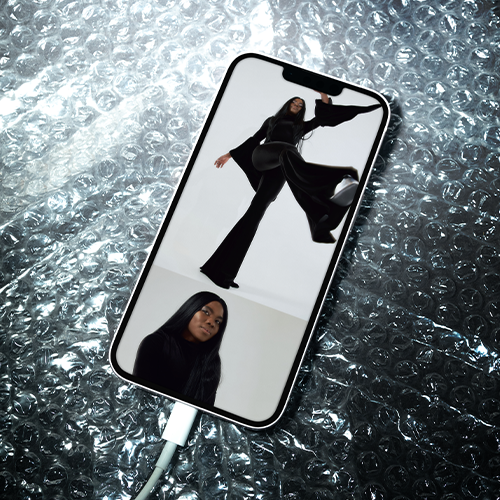 A shot of an IPhone with two images of an Editorial Studio Session for a fashion brand by The Latest.
