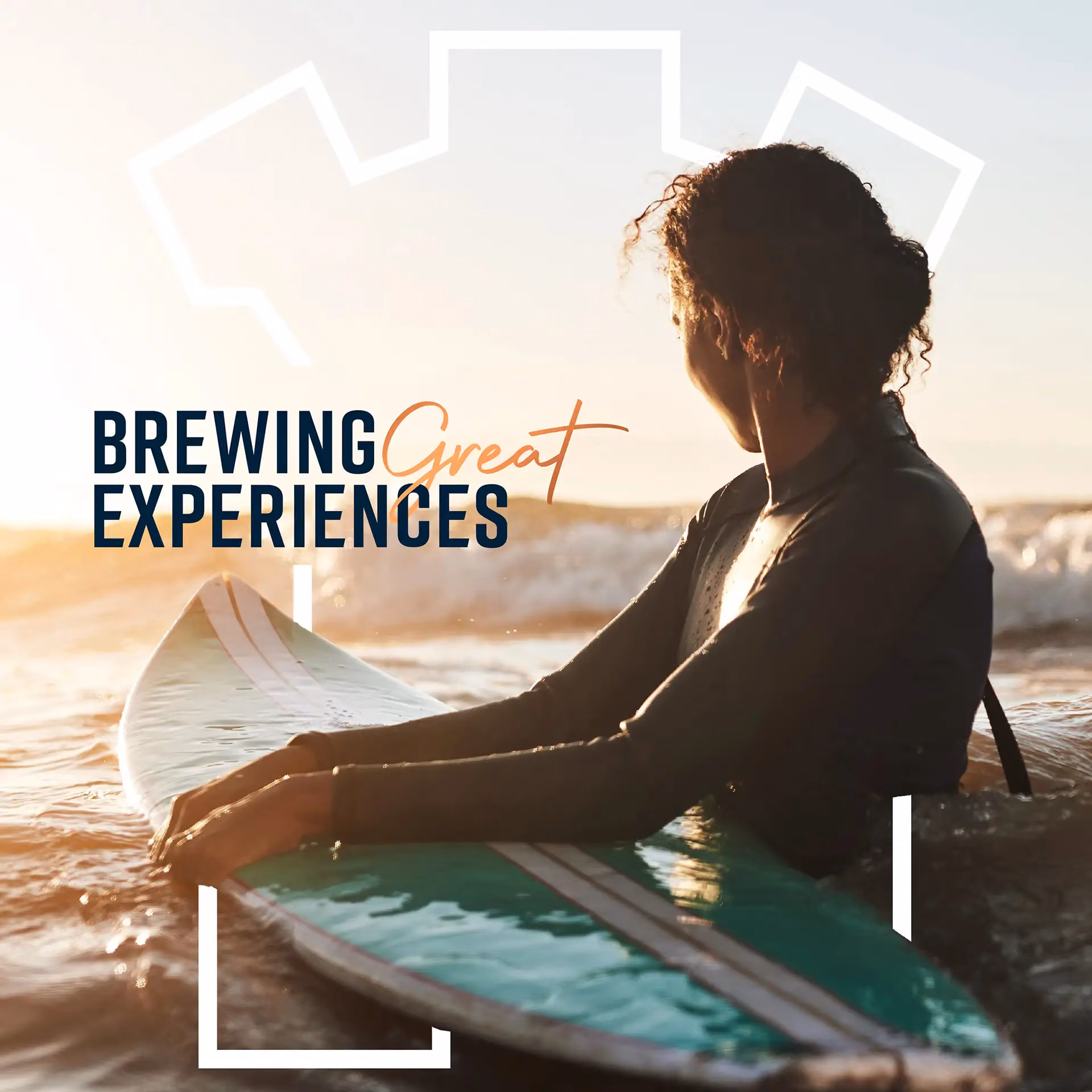 a young lady in the surf waiting for the next wave with the text 'brewing great experiences' written on top of the image
