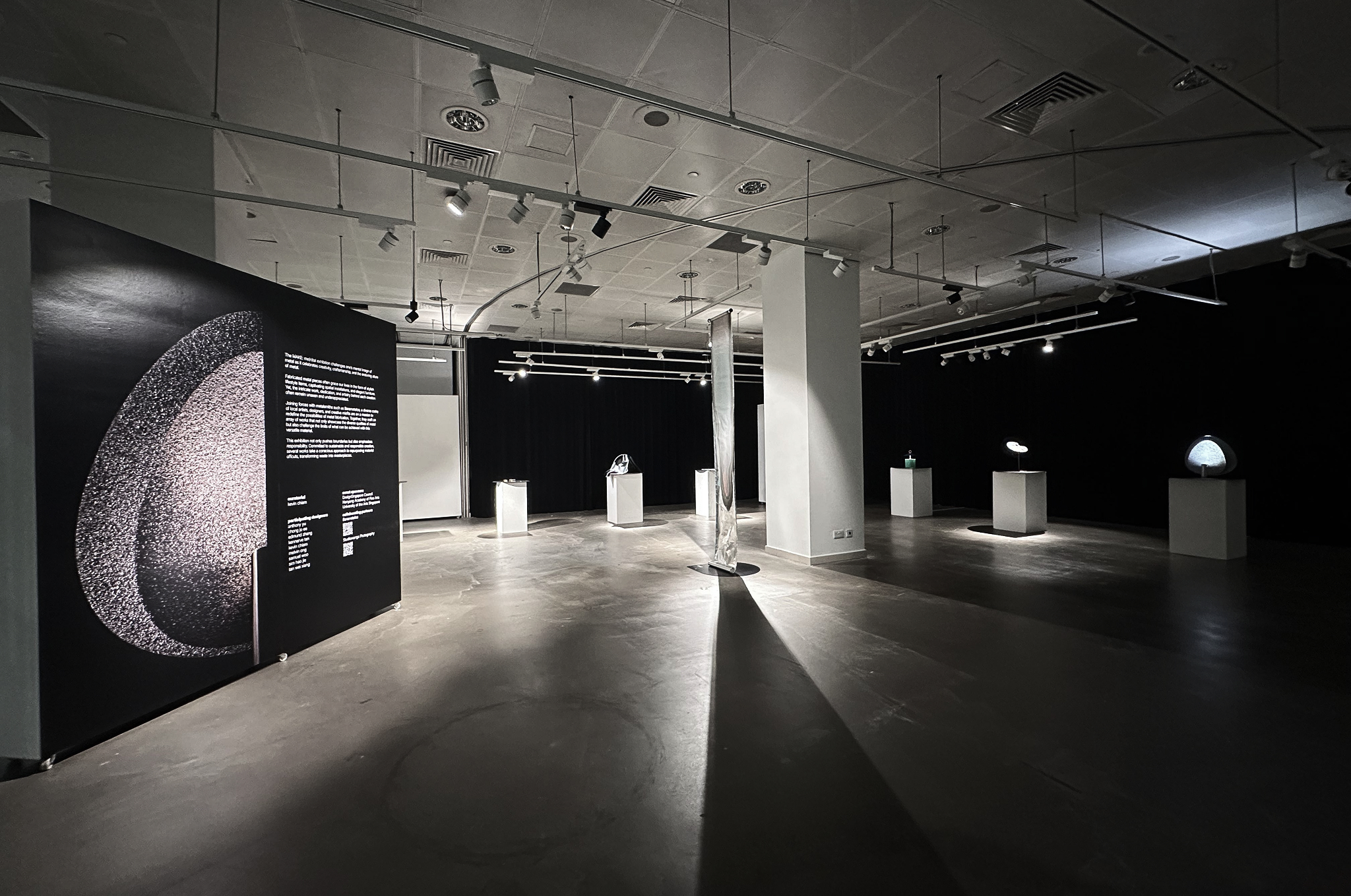 [background image] image of art supplies on a desk (for a graphic design studio)