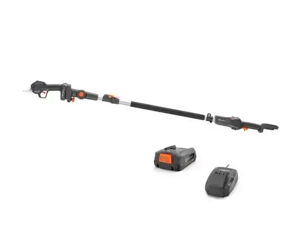 Husqvarna ASPIRE PS30X TELE Astschere mit Akku und Ladegerät auf weißem Hintergrund.