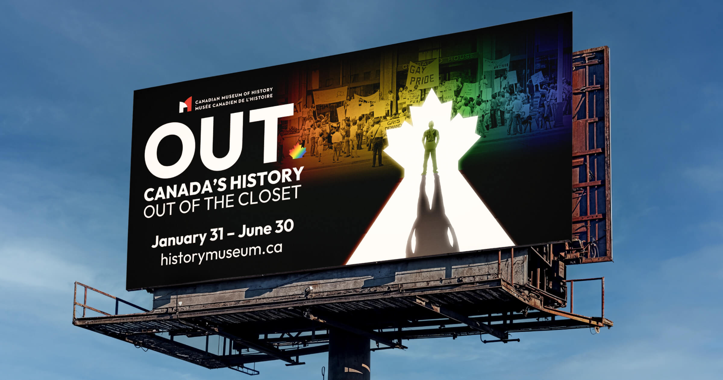 A billboard advertisement promoting the OUT exhibit.