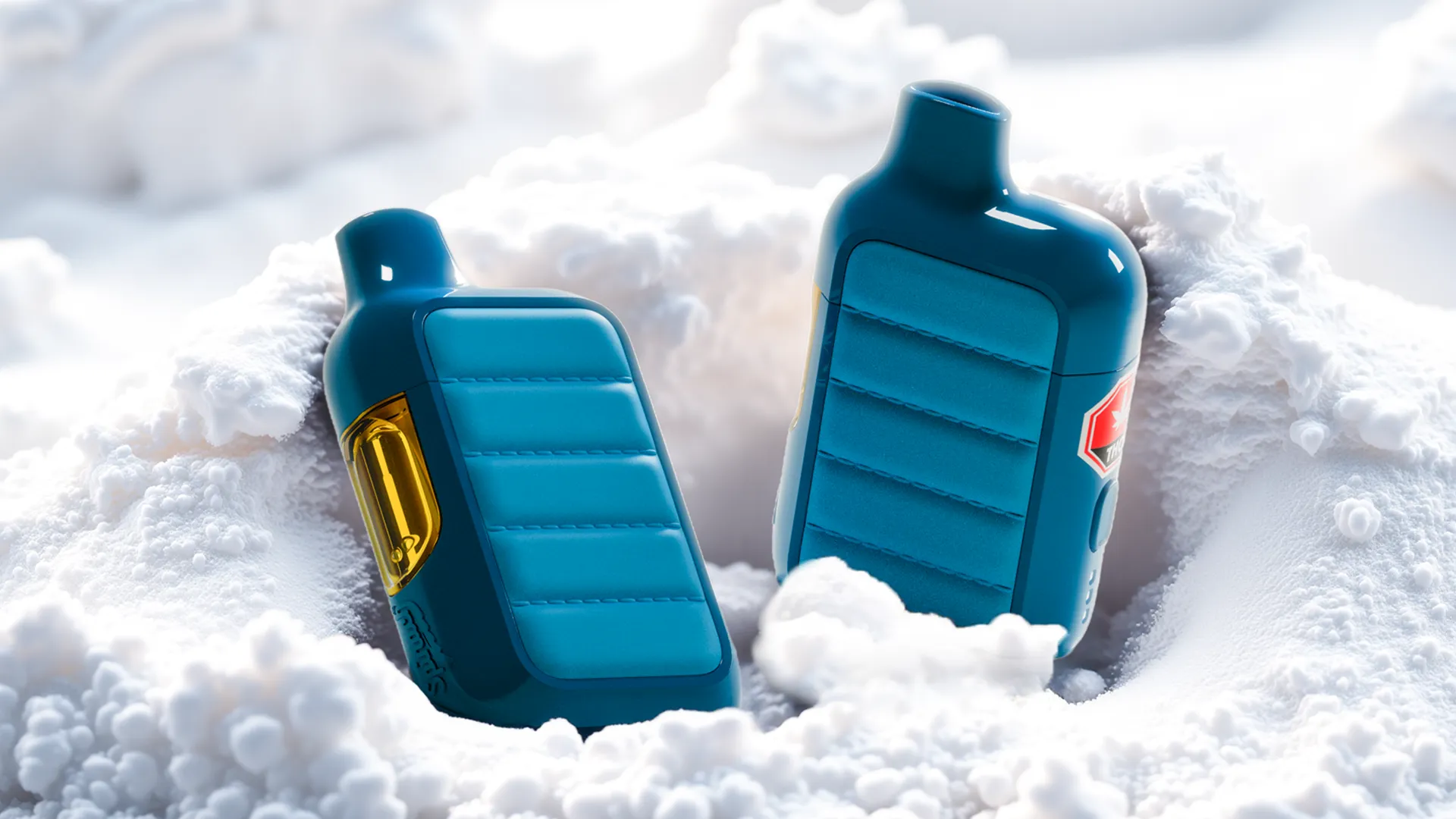 Teal Pufferz all-in-one vape device nestled in soft white clouds.