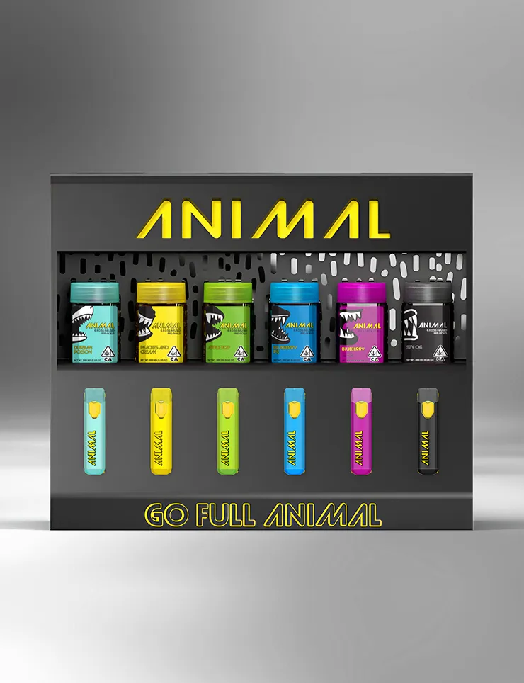 ANIMAL countertop display with colourful cannabis jars and matching disposable vapes, Go Full Animal slogan.