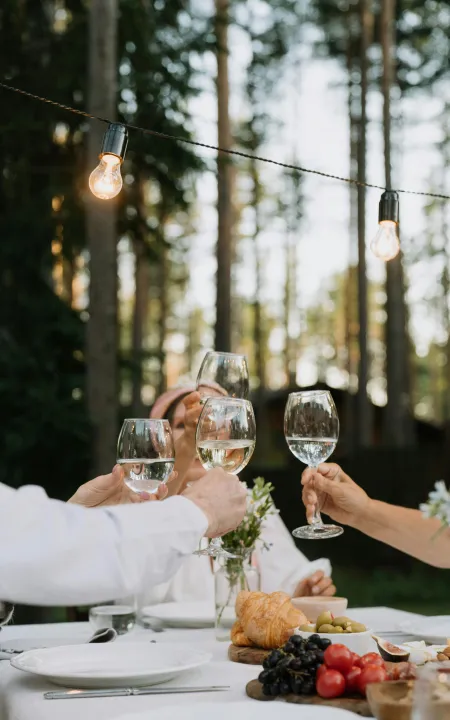 A group of people eating at a table during a farewell brunch