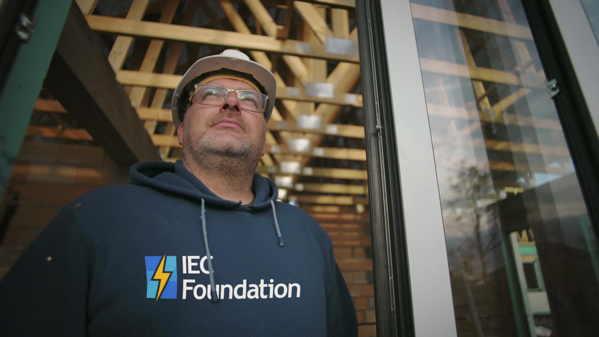 IEC Foundation rebrand mock up of logo on electrical workers hoodie