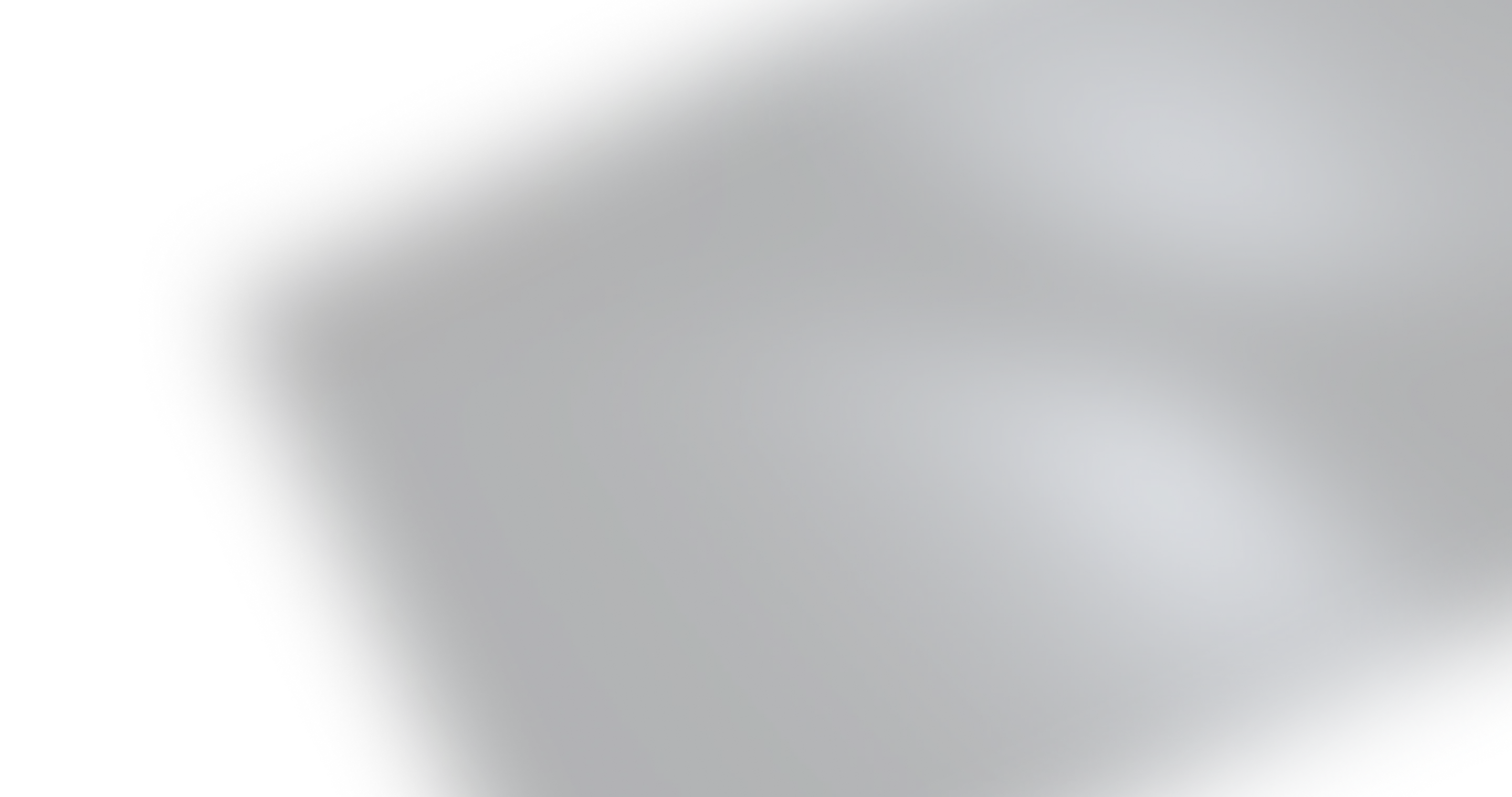Dark abstract gradient background with subtle light spots in blue-gray tones.