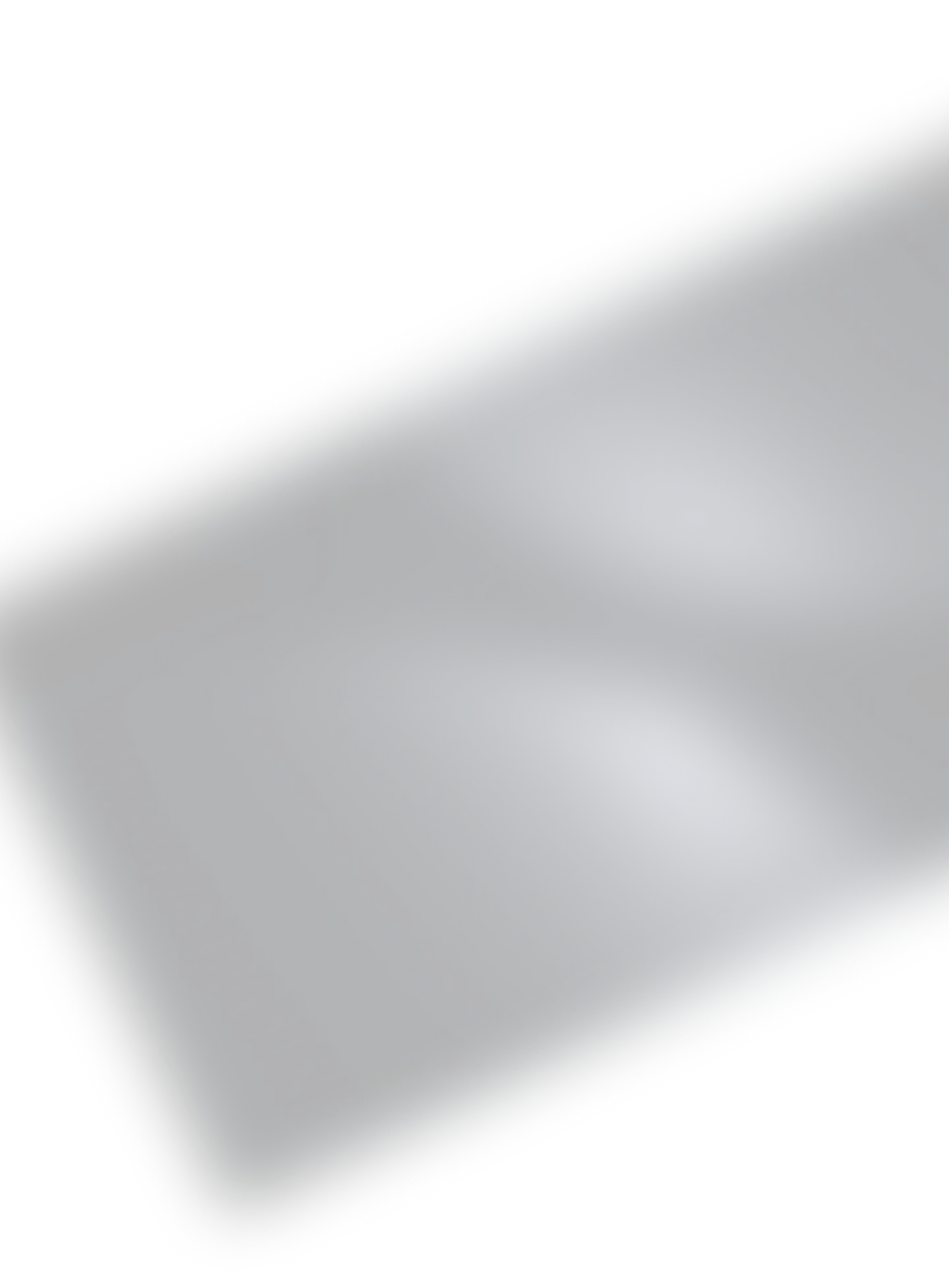Smooth dark gray gradient background with soft, rounded light reflections creating a glossy effect.