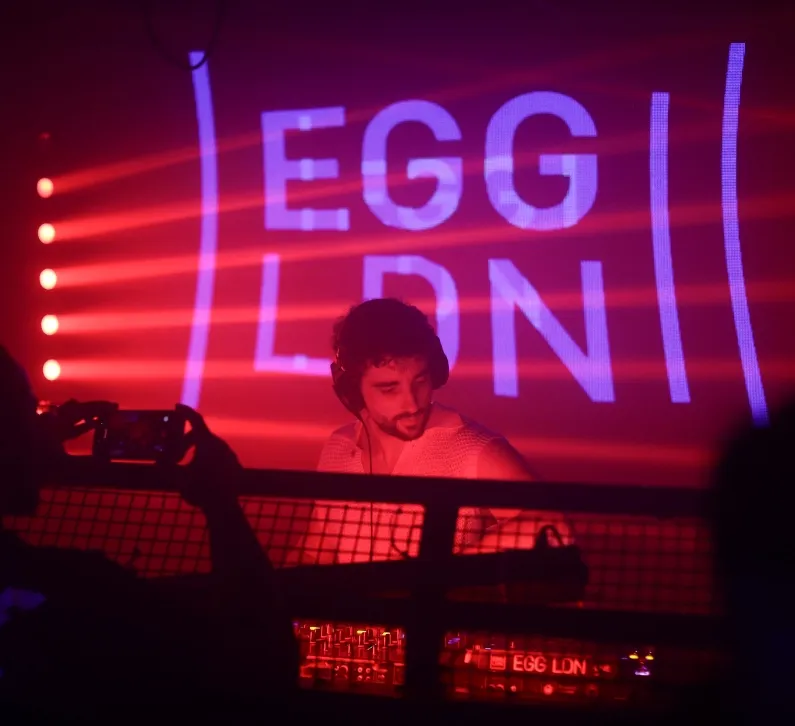 A music producer DJing for LSA Records at Egg London
