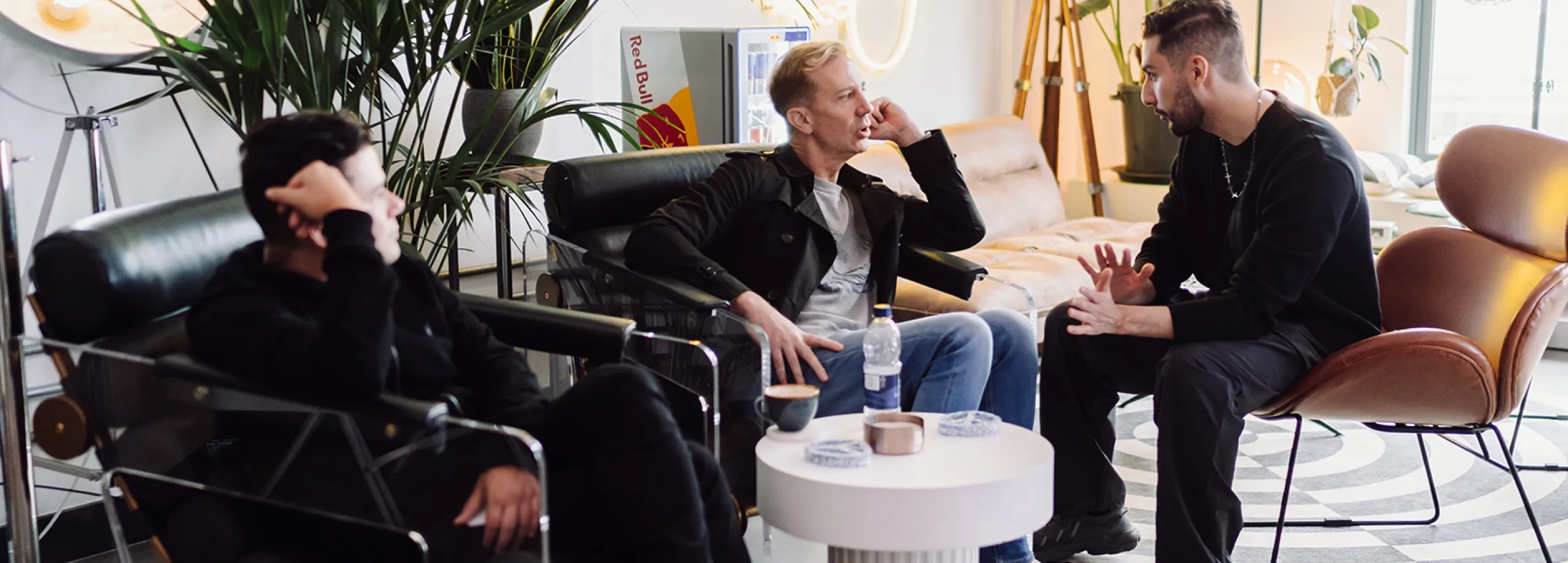 A student discussing DJ course options in London Sound Academy's reception
