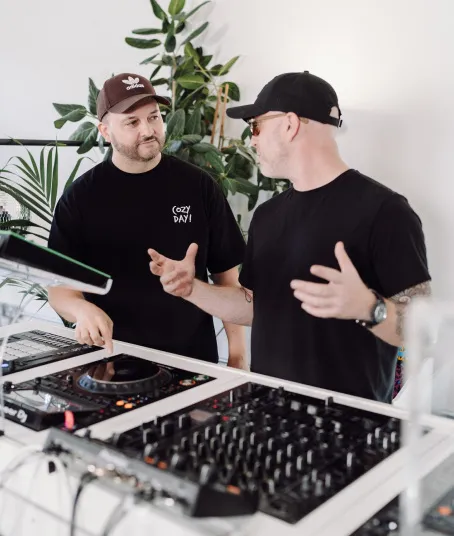 A candid moment of an intermediate DJ course lesson on mixing techniques.