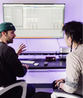A London Sound Academy DJ tutor shows an advanced DJ course student how to master Rekordbox