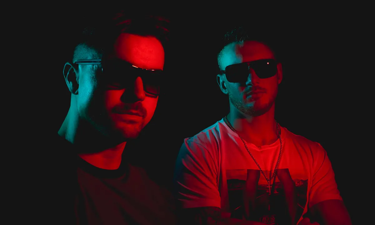 A DJ duo photoshoot with interesting coloured lighting