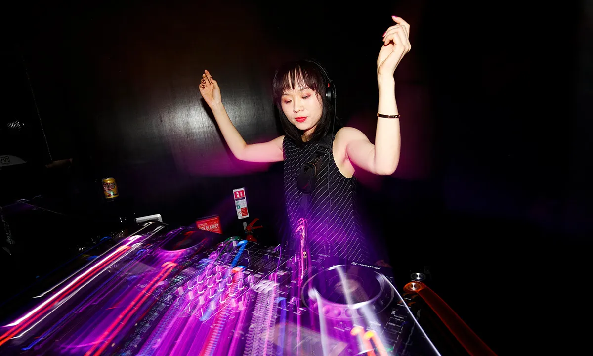 A stylish DJ photo with captivating lights and colours