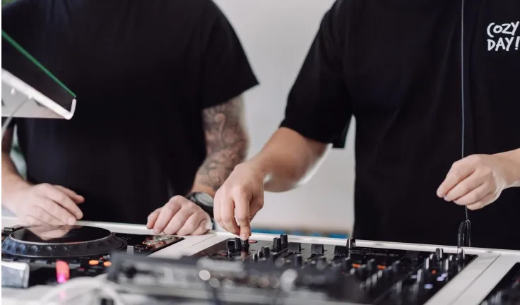 A DJ lesson taking place in a professional DJ studio in London