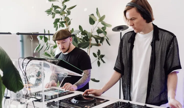 A DJ lesson taking place in a professional DJ studio in London
