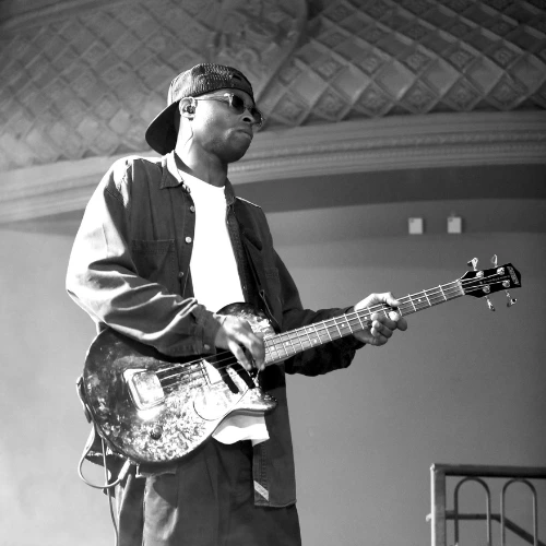 Bass Guitarist, LSA DJ and music production tutor Paul performing on stage.
