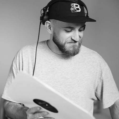 London Sound Academy DJ tutor Connor poses with some records