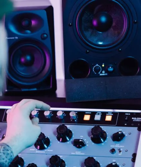 Mixing and mastering recording studio equipment including monitors and compressors