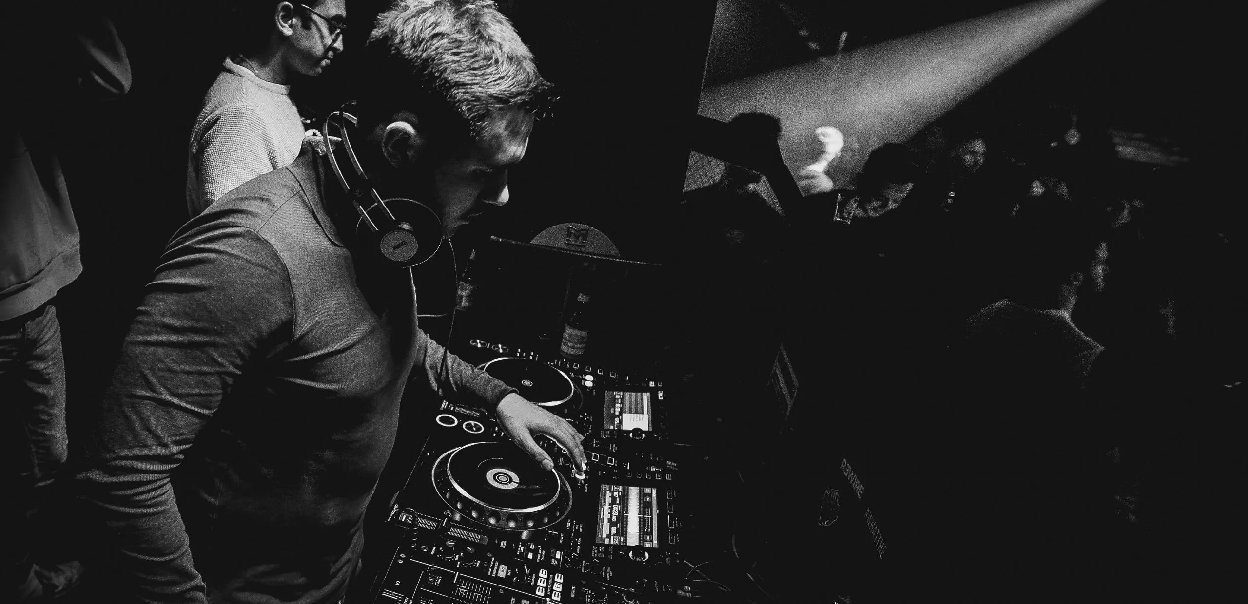 A DJ performs at a club night in London