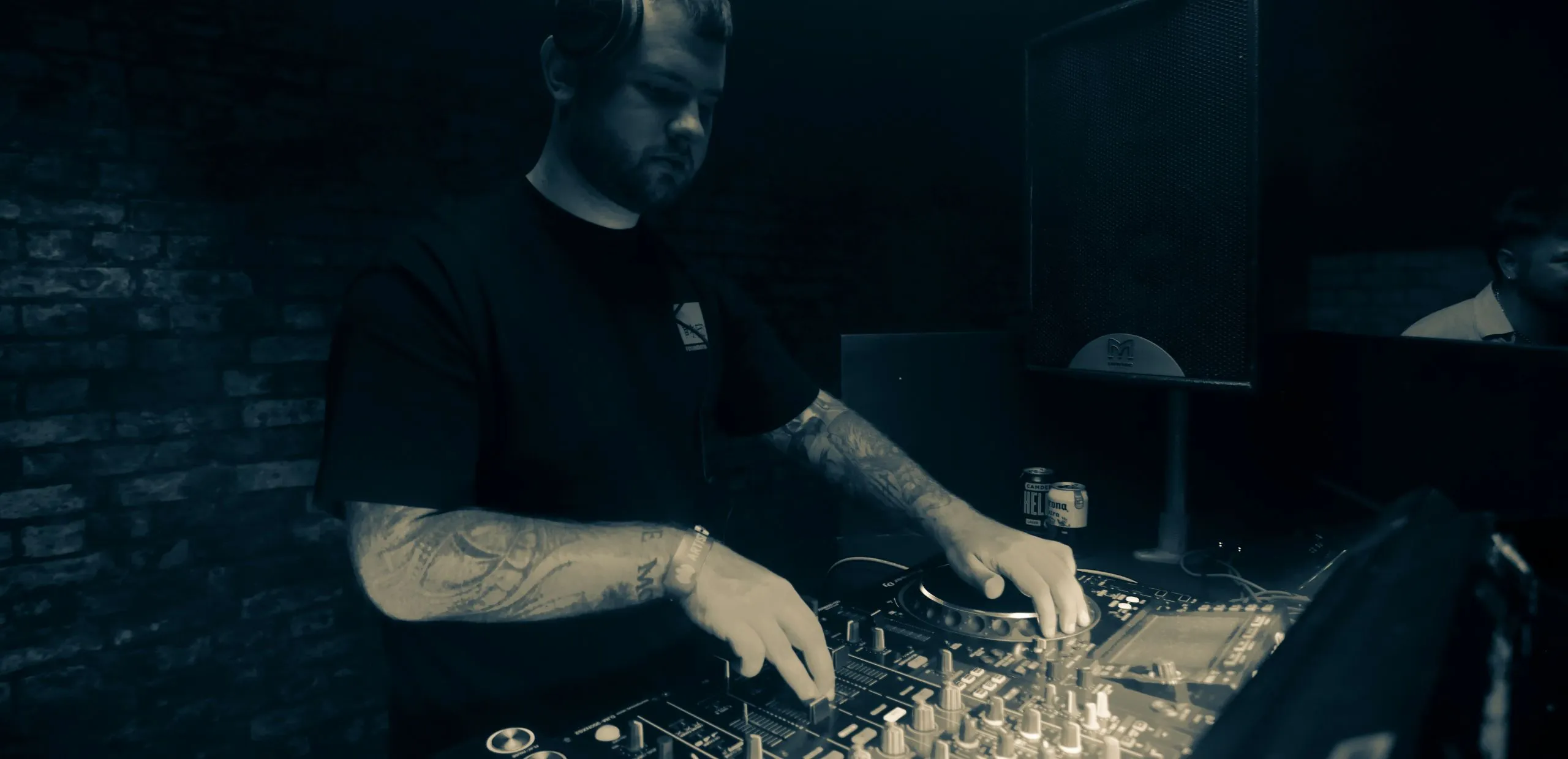 A club promoter DJ performs