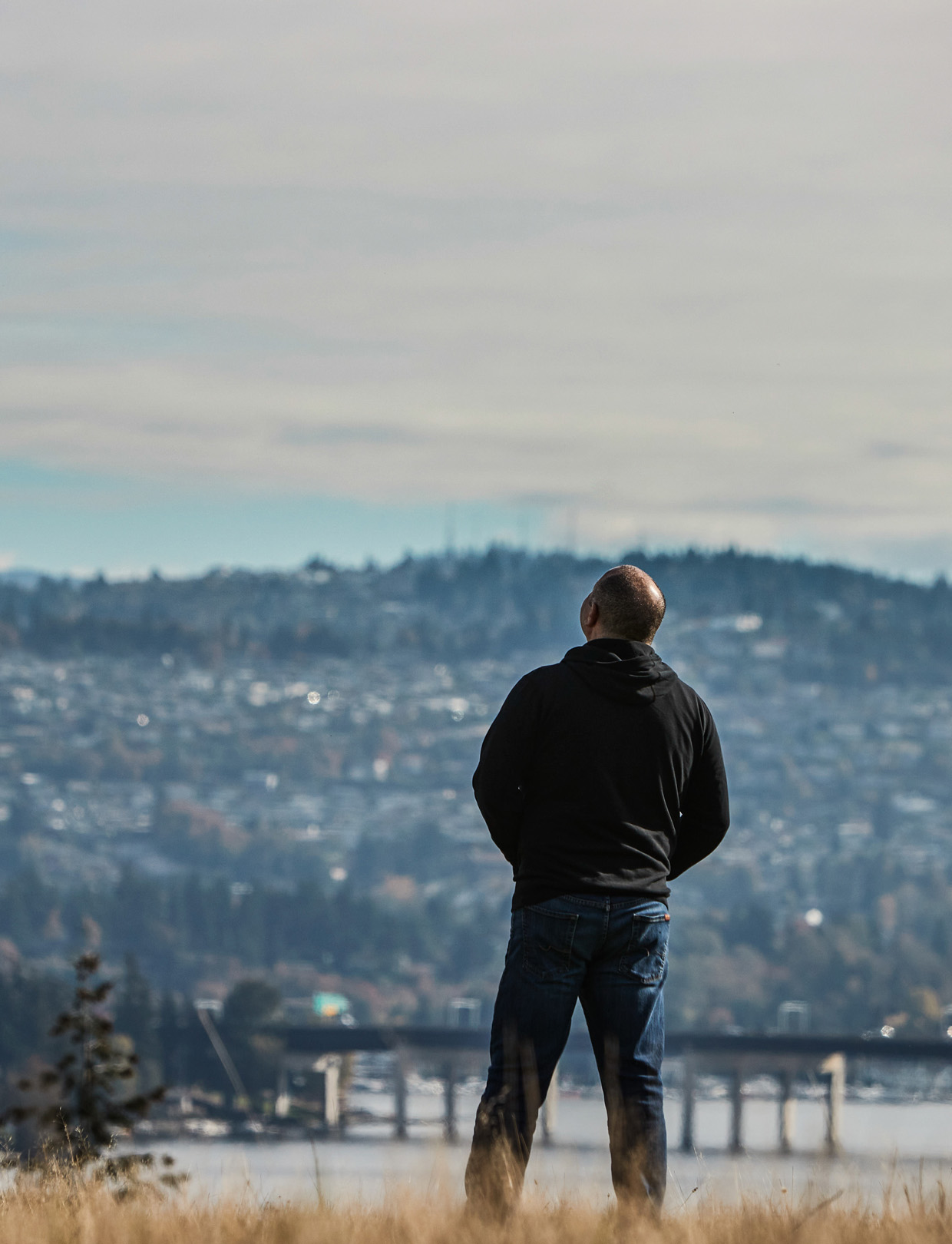 Marc Rousso - founder of The Vision Academy - looking out to the sky above the city.