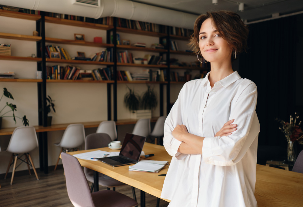 Smiling female entrepreneur looking confident and intentional. 