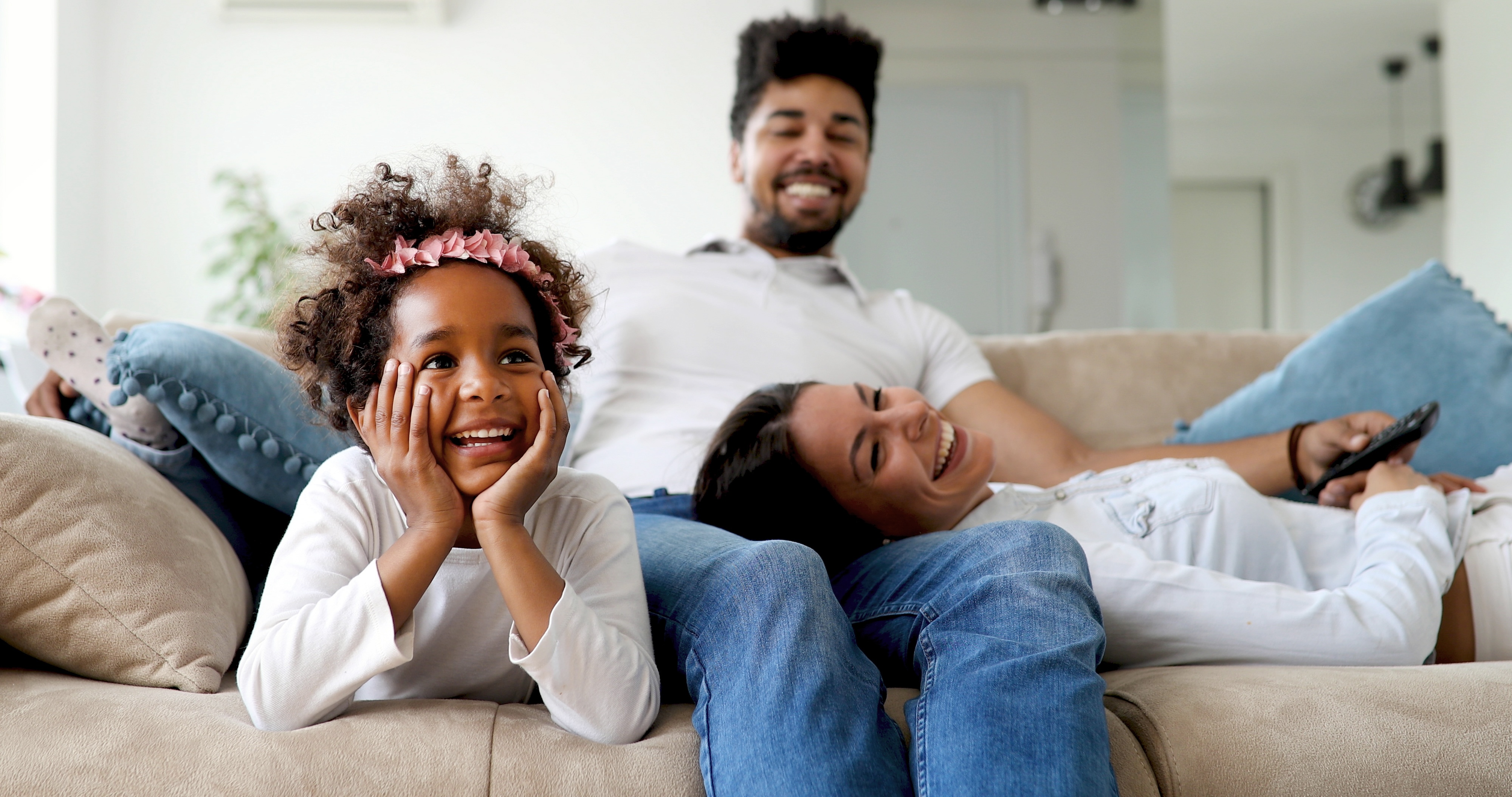 Family on Couch Stock Photo