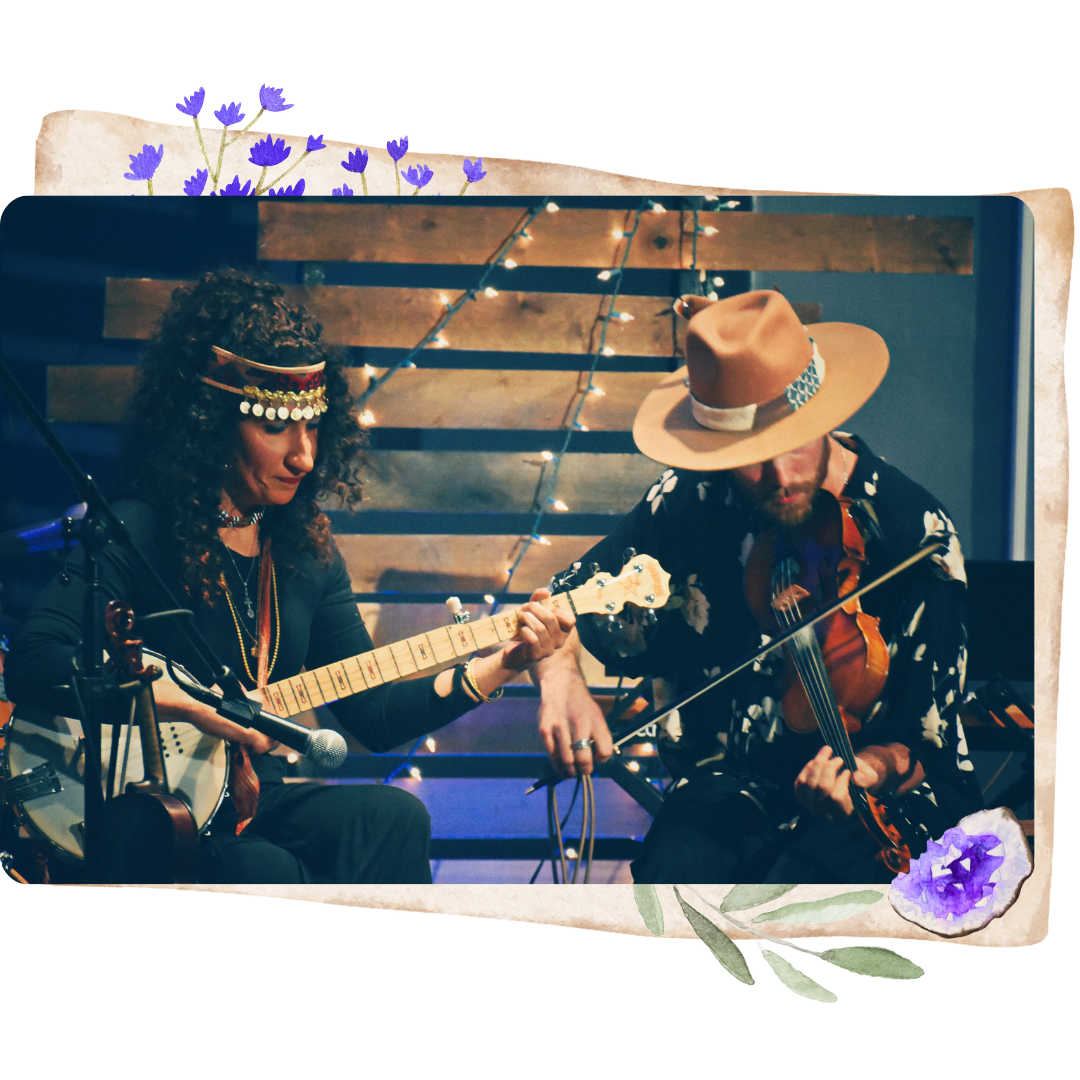 a photo of lydia with her band Singing the Bones playing the banjo