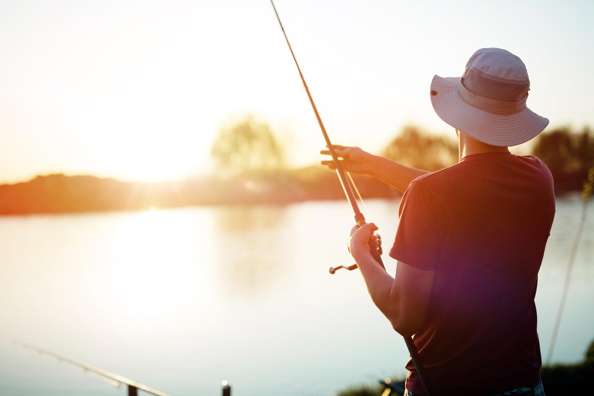 man fishing riverwalk landing florida gulf coast retirement community