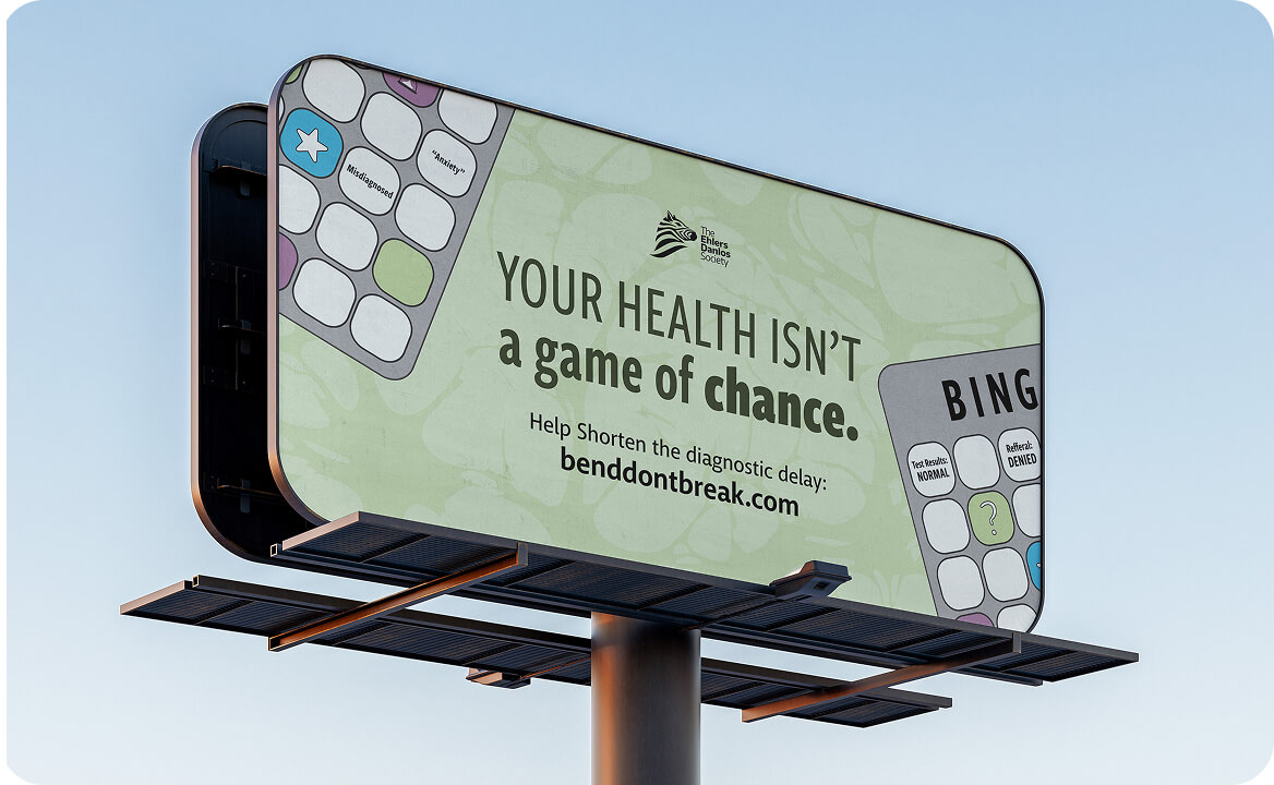 Billboard with message 'Your health isn't a game of chance' encouraging help to shorten diagnostic delay with website benddontbreak.com, featuring a game card design.
