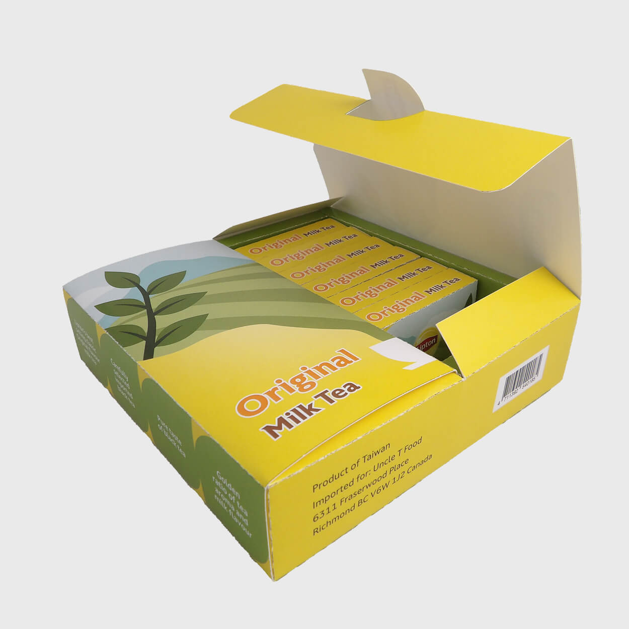 Open yellow and green box labeled Original Milk Tea showing multiple tea packets inside.