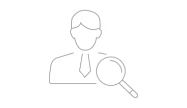 Icon of a person wearing a suit with a magnifying glass focusing on the chest area, representing recruitment or candidate search.