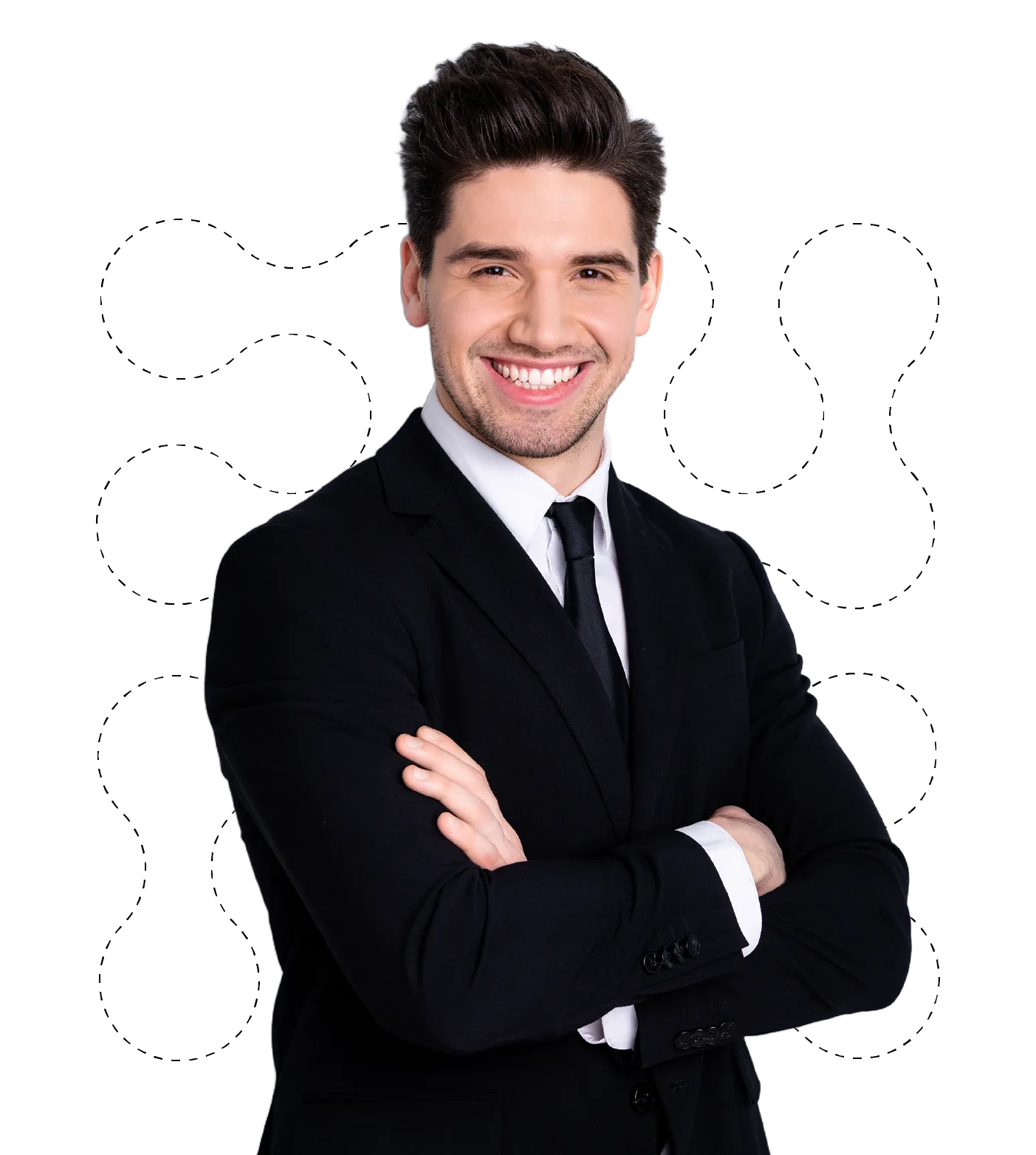 Smiling young man in a black suit with arms crossed against a white background with abstract dotted designs.
