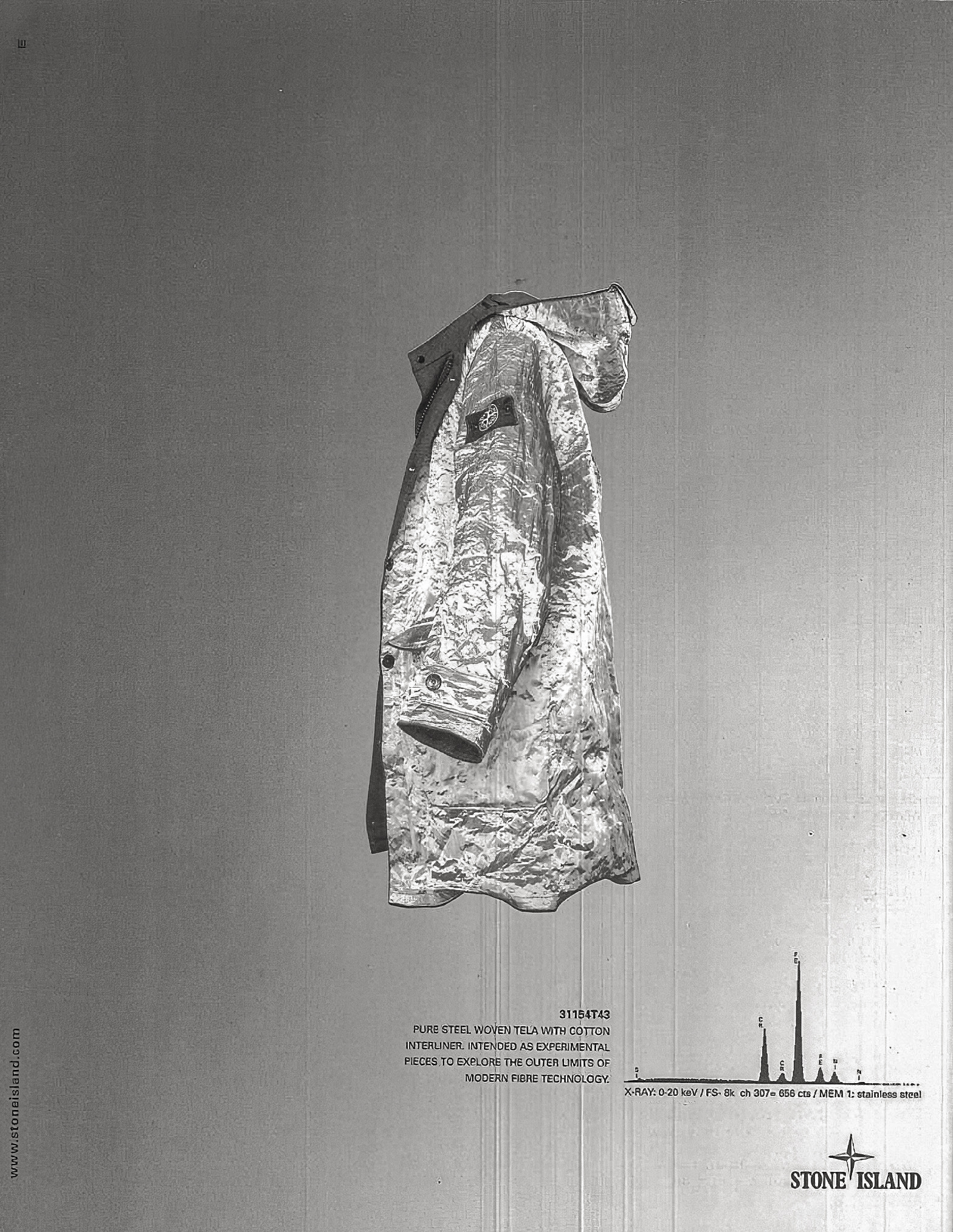 One designer could still speak for the whole house. Image Credit: Stone Island, Pure Metal Shell advertisement, Autumn Winter ‘999’000 (Art. 31154T43). Courtesy Stone Island.