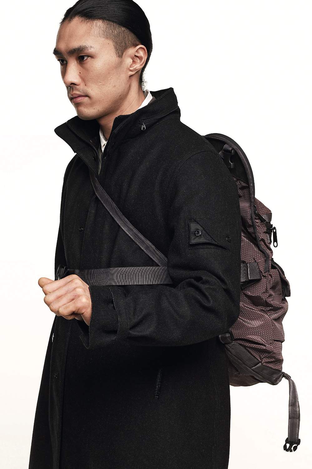 Completion moved inside a system designed to be refilled. Image Credit: Stone Island Shadow Project, Look 1, ’009–’010. Stealth Coat 7WZ9 (PROOF), Zip Shirt 1YZ8 (SKIN), Cargo Pant 3WZ1 (RESIST), Web Belt, Bagjack® Bag (EQUIP). Courtesy Stone Island.