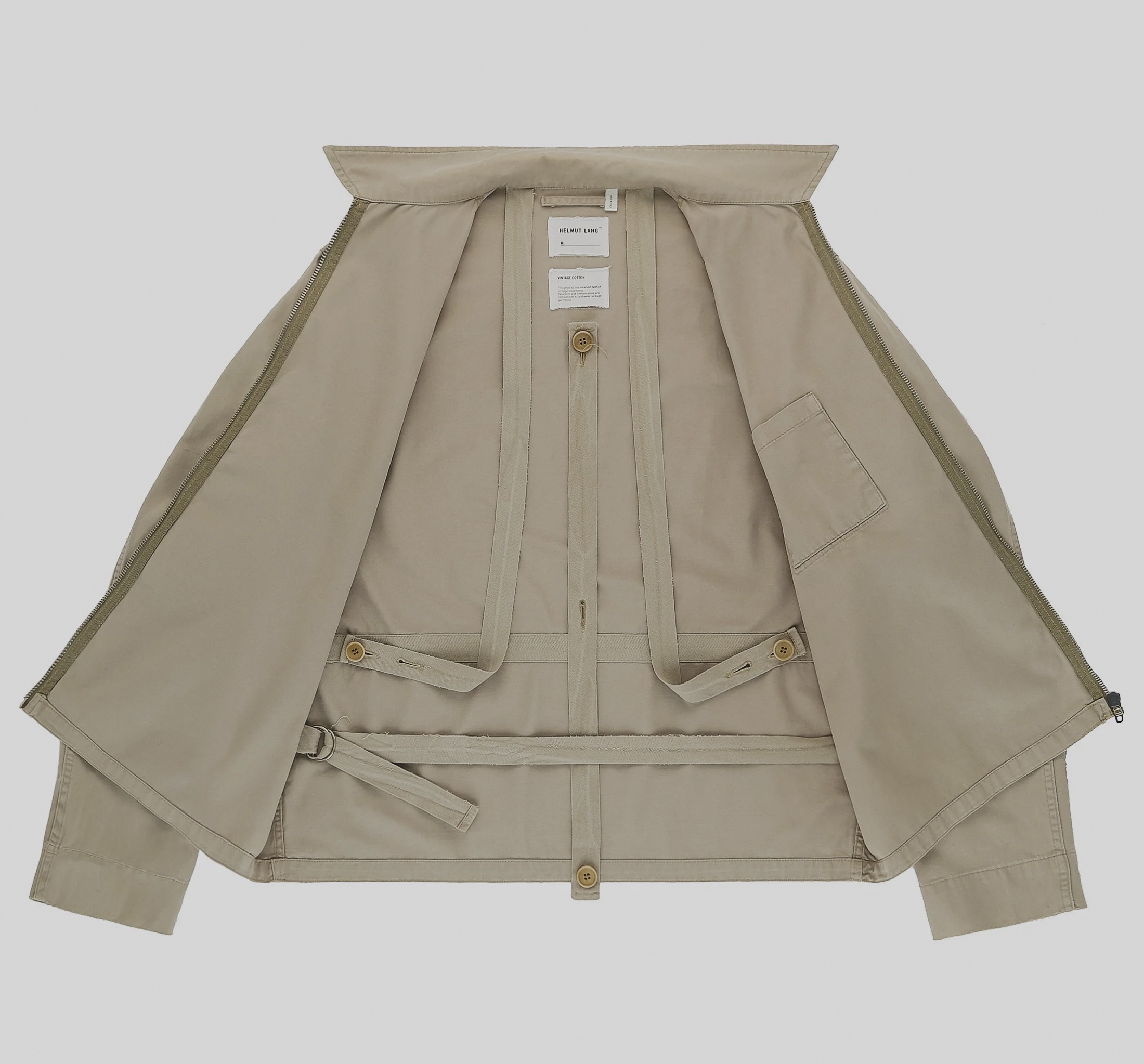 Caption: The mechanism remains constant while its possible assignments multiply.Image Credit: Helmut Lang Jeans, Broken Twill Bondage Blouson, interior, Spring/Summer 2000. Courtesy Endyma, Berlin.