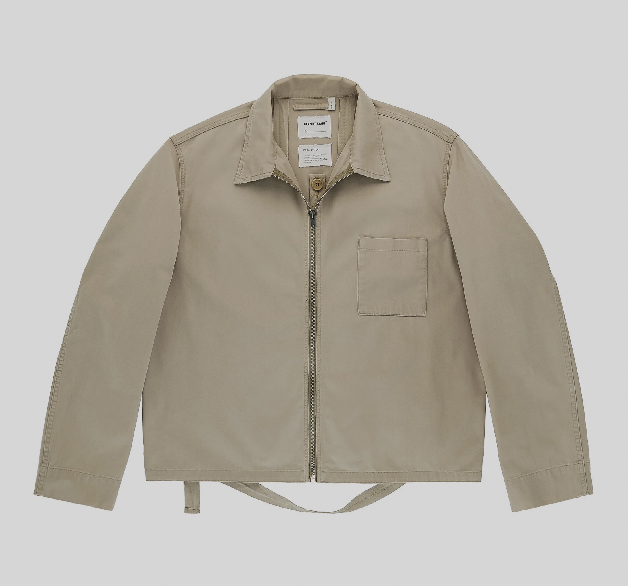 Nothing on the exterior announces the system concealed inside. Image Credit: Helmut Lang Jeans, Broken Twill Bondage Blouson, Spring/Summer 2000.
