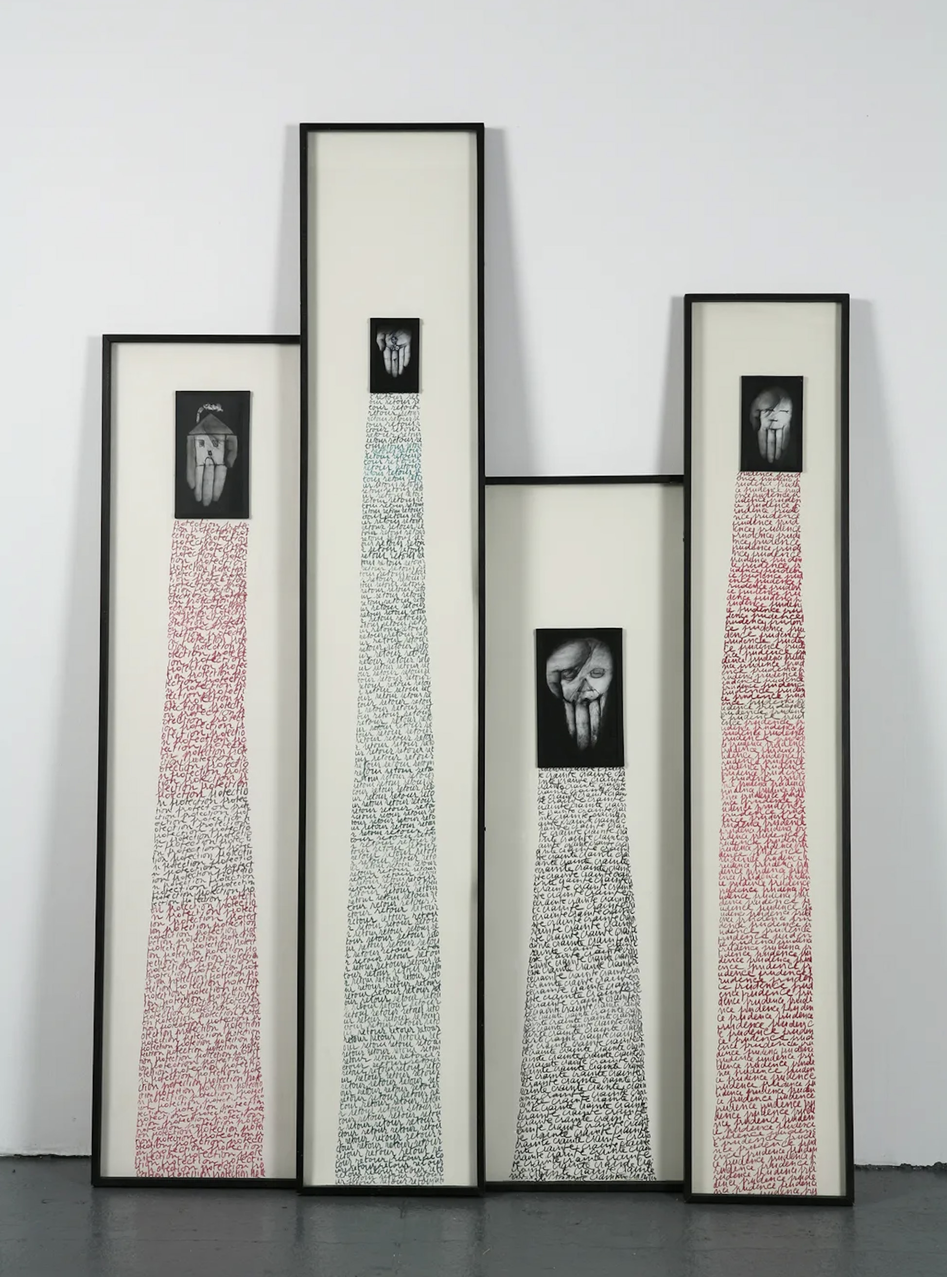 Photographs of hands anchor vertical fields of accumulated writing. Image Credit: Annette Messager, Les Lignes de la main, 1988. Photo: Rebecca Fanuele.