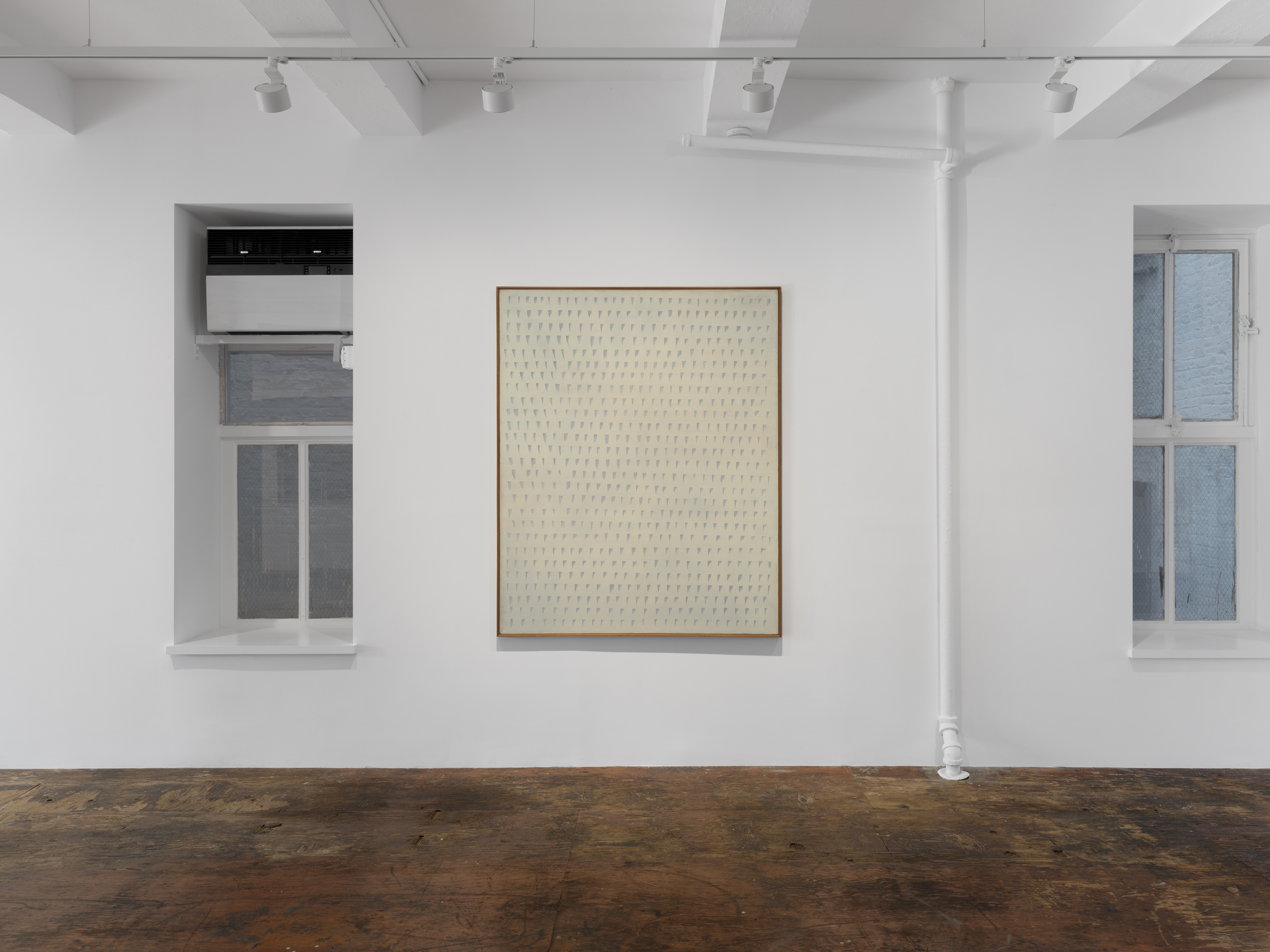 Further along the wall, 74-5 hangs alone between two niches. Image Credit: Cho Yong-Ik, 74-5, 1974. Installation view, The Irreducible I, Kiang Malingue, 2026. Photo: Dan Bradica.
