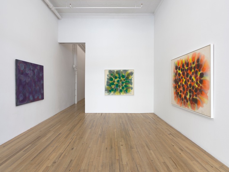 The green painting occupies the back wall, with the violet and orange canvases facing one another across the exhibition. Image Credit: Exhibition view. Courtesy Andrew Kreps Gallery. Photo: Elisabeth Bernstein.