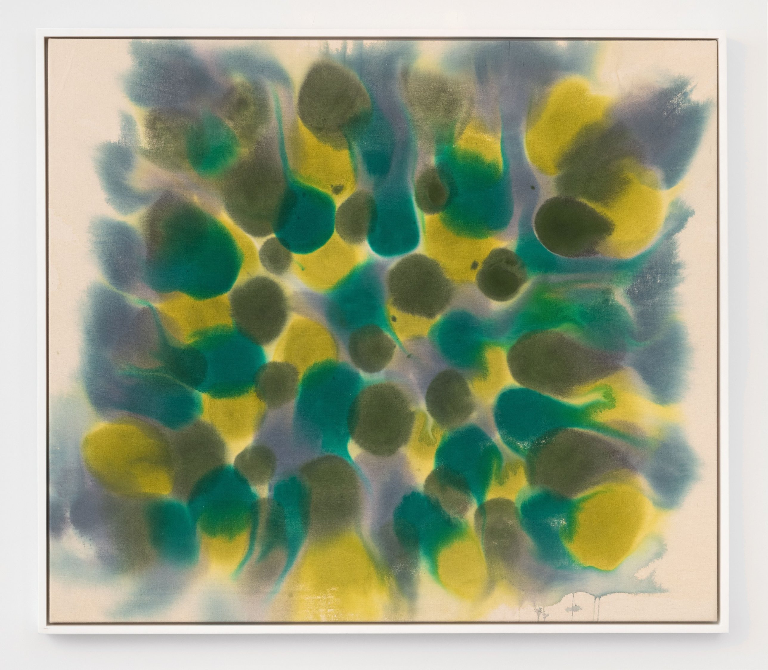 Olive, teal and yellow on bare canvas. The teal moves outward in opposing directions; a grey-violet fringe reaches the upper edge. Image Credit: Untitled, 1970. © Kenneth Victor Young. Courtesy Andrew Kreps Gallery, New York.