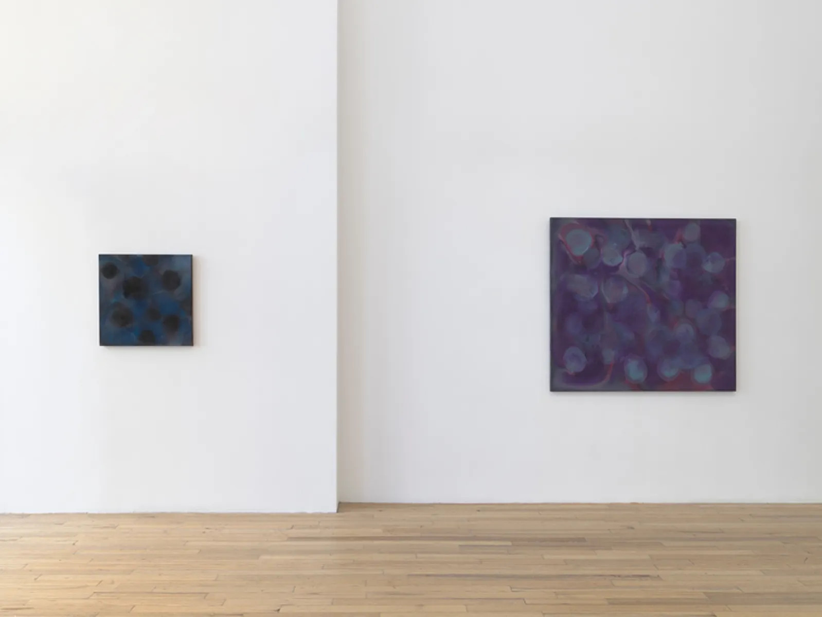 The blue-grey and violet paintings on neighbouring walls, their colour carried to every edge. Image Credit: Exhibition view. Courtesy Andrew Kreps Gallery. Photo: Elisabeth Bernstein.