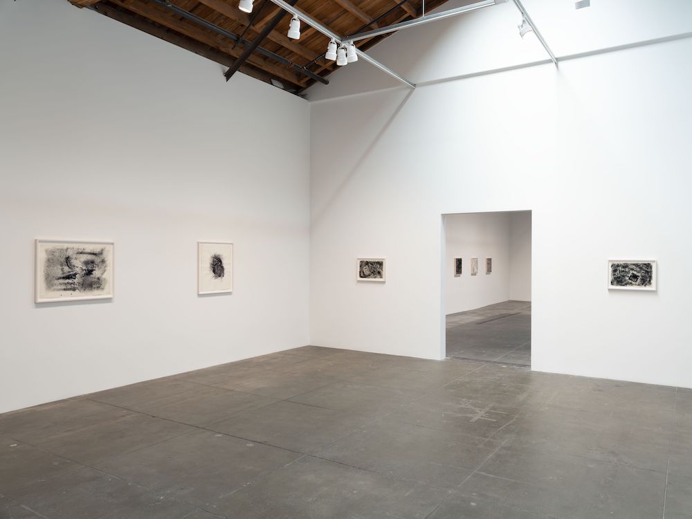 A wall of works on paper. The gallery describes the Site works as textures transferred directly onto Japanese paper. Image Credit: Installation view, Jack Whitten: The Numinous, Hauser & Wirth Downtown Los Angeles, 2026–27. Photo: Roger Edwards.